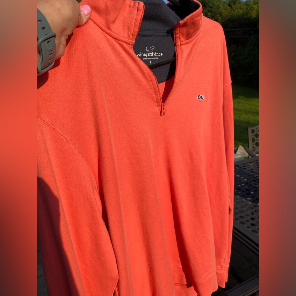 Quarter zip, orange with navy collar used, but very good condition